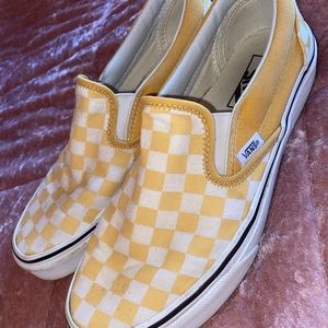 Vans yellow checkered slip ons